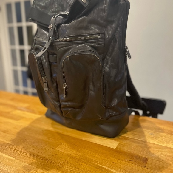 All leather Tumi London Roll top bag. Used half a dozen times. In great shape. - Picture 4 of 9